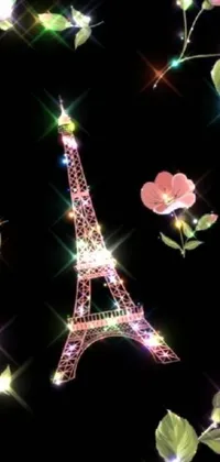This beautiful phone live wallpaper features a digital art rendition of the Eiffel Tower, entwined with flowers and leaves, creating a romantic, Tumblr-esque vibe