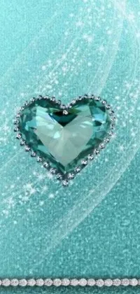 Find peace and serenity with this mesmerizing phone live wallpaper featuring a stunning blue heart on a calming background