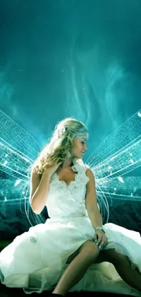 This phone live wallpaper depicts a fantasy-themed digital art featuring a woman in a white dress and a heavenly angel surrounded by swirls of teal ethereal tendril wings