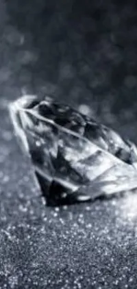 This phone live wallpaper boasts a close-up shot of a diamond, giving your device a touch of luxury