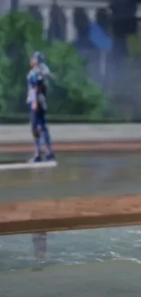 This is a dynamic live wallpaper for your phone that features a blurry picture of a person riding a skateboard