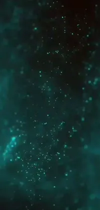 This phone live wallpaper highlights a body of water with bubbles in a teal palette inspired by cinematic work resulting in a visually stunning scene, dreamlike and otherworldly, reminiscent of a hyperspace creature from science fiction