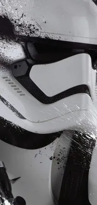 This live wallpaper for phone displays a high-definition, close-up image of a stormtrooper helmet from the popular Star Wars franchise