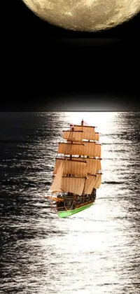 This phone live wallpaper depicts a boat sailing on calm waters under a full moon