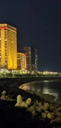 Enjoy a stunning view of a futuristic Mumbai at night with this live wallpaper on your phone