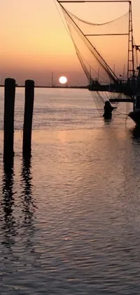 Bring the beauty of a peaceful evening harbor in New Orleans to your phone with this stunning live wallpaper