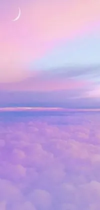 This phone live wallpaper features a stunning image of an airplane flying above the clouds amidst a beautiful night sky