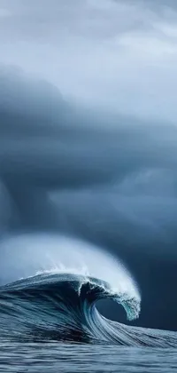 This phone live wallpaper features a realistic depiction of a surfer riding a wave on a surfboard