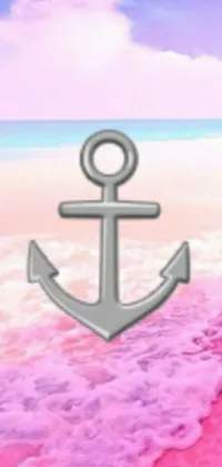 This exquisite phone live wallpaper showcases an anchor resting on a pristine beach by the ocean, capturing a beautiful seaside scene