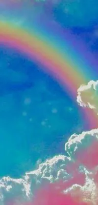 Experience the mesmerizing beauty of a rainbow in the sky with this stunning live wallpaper