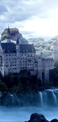 Step into a dreamlike world with this phone live wallpaper! Immerse yourself in the beauty of a medieval castle, set amidst a lush green landscape, with a roaring waterfall flowing right by its side