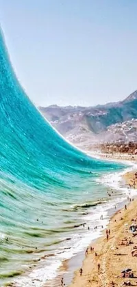 This phone live wallpaper features an incredible hyperrealistic painting of a group of people standing on a beautiful beach next to a tube wave in the red sea