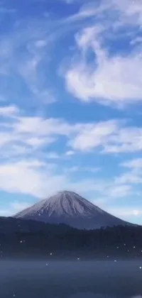 This live wallpaper for phones displays a serene water scene with a mountain in the background