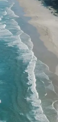 This phone live wallpaper is a breathtaking vision of a stunning emerald coast in South Africa