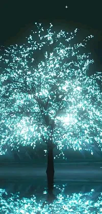 This phone live wallpaper features an immersive scene of a beautifully lit tree with interactive art in a tranquil white- and cyan-themed design