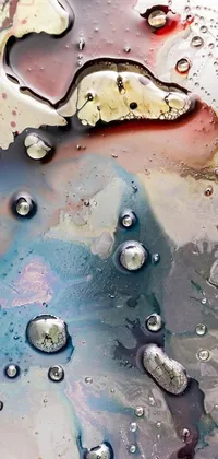 Immerse yourself in a stunning phone live wallpaper showcasing water bubbles popping on a realistic surface