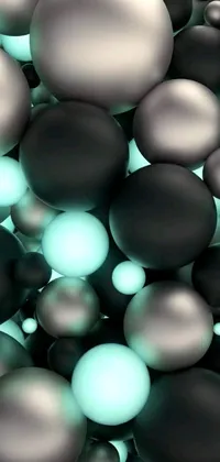 Get a stylish and modern looking phone wallpaper with shiny black and silver balls that move on your screen