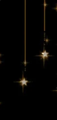 This mobile live wallpaper boasts an awe-inspiring display of shimmering stars that twinkle against a backdrop of black