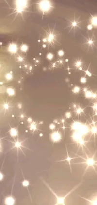 Elevate your phone's aesthetic with this lively teddy bear live wallpaper that features a magnificent bed filled with sparkling stars, complemented by a glittering gif and radiant radial light