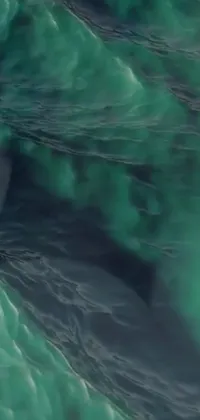 Get ready to catch the wave with this mesmerizing live wallpaper for your phone