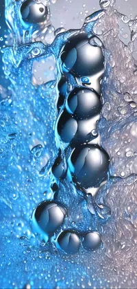 This live wallpaper for your phone showcases a breathtaking close-up of water bubbles on a mesmerizing blue surface