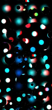 This live wallpaper features an immersive array of colorful dots set against a deep black backdrop