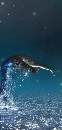 This live wallpaper showcases a stunning image of an individual riding a wave on a surfboard in the ocean at night