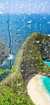 This phone live wallpaper shows a rainy window overlooking the stunning ocean scenery of Bali