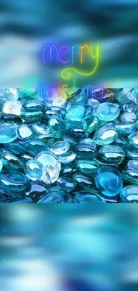 Looking for a serene and stylish live wallpaper for your phone? Check out The Blue Stones Live Wallpaper! This digital art masterpiece features a bunch of blue stones on a tranquil body of water, complete with a festive Christmas touch