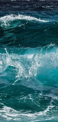 This stunning live phone wallpaper shows a surfer riding a gigantic wave