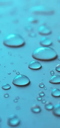 This water droplets live wallpaper for your phone features a close-up view of droplets on a surface