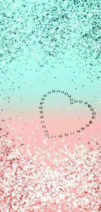 Enhance your phone's home screen with this festive live wallpaper! Featuring a heart made of shimmering confetti on a cheerful pink and blue background, this customizable wallpaper is perfect for Valentine's Day or any romantic occasion