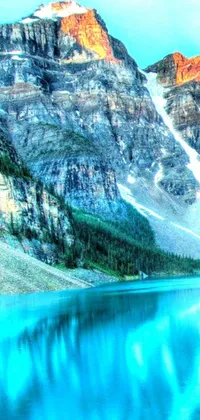 This phone live wallpaper showcases a serene mountain landscape photographed in Canada