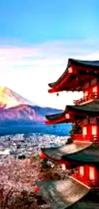 This stunning phone live wallpaper showcases a breathtaking pagoda set against picturesque mountains - popularly trending in Japan