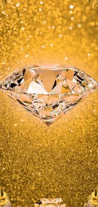 This phone live wallpaper showcases a mesmerizing close-up of a diamond on a luxurious gold background