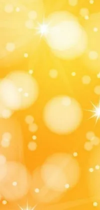 This live wallpaper features a yellow background with a stunning display of stars and sparkles sourced from Pixabay