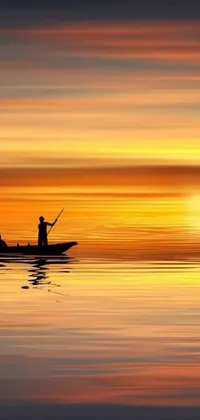This live phone wallpaper depicts a tranquil body of water with a person in a boat, surrounded by angling individuals at the edge
