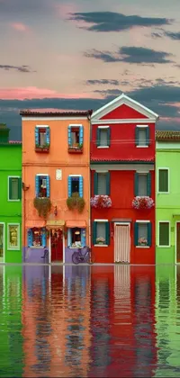 Experience the beauty of a picturesque row of colorful buildings in this live phone wallpaper
