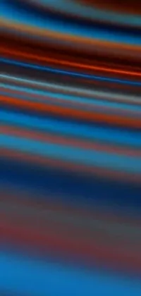 This live wallpaper features a blurry blue and orange background inspired by abstract art