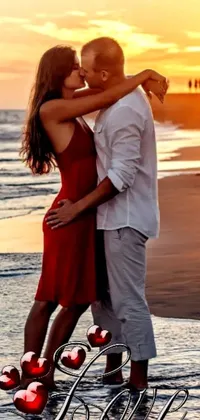 This stunning live wallpaper features a passionate couple amid a stunning beach sunset