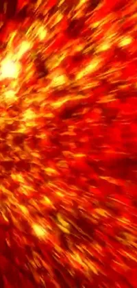This phone live wallpaper is a captivating digital art animation featuring an explosion of red and yellow colors against a fiery environment