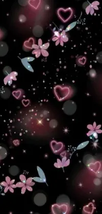 This phone live wallpaper features pink flowers, hearts and glittering stars against a black background