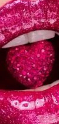 This phone live wallpaper features a stunning close-up view of luscious lips coated in a vibrant deep pink shade with flickers of glitter infused within it