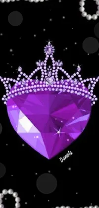 This mobile live wallpaper features a stunning purple heart with a diamond-crafted crown atop