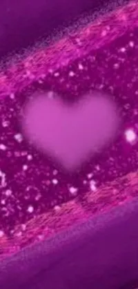 This live wallpaper features a vibrant purple box with a heart in the center, set against a glittering pink and purple background