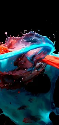 This live wallpaper depicts a toothbrush featuring red and blue paint, created using action painting by Alberto Seveso