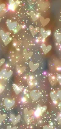 This live phone wallpaper features floating hearts, shimmering stars and sprinkles of fairy dust