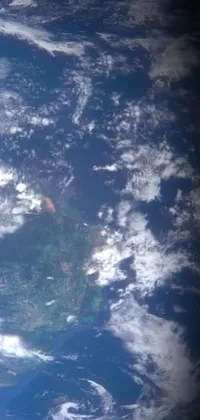 This live wallpaper showcases a breathtaking view of the Earth from space