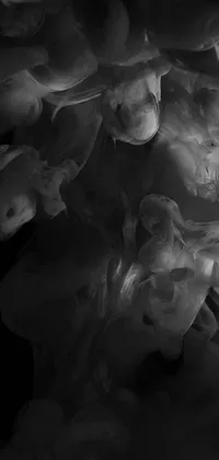 This phone live wallpaper features a dramatic black and white photo of smoke floating in the air