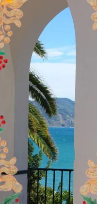Get your phone screen upscaled with this stunning live wallpaper that features an ocean view from a window as its centrepiece